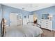 Cozy bedroom with hardwood floors, ensuite bathroom, and ample closet space at 11835 Crawford Parrish Ln, Parrish, FL 34219