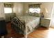 Bright bedroom with hardwood floors, a window, and light walls at 1212 45Th E Ave, Ellenton, FL 34222