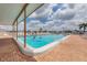 Enjoy the community pool under a covered area on a beautiful day with plenty of seating at 1212 45Th E Ave, Ellenton, FL 34222