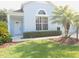 Inviting single-story home featuring well-manicured lawn and landscaping at 12301 Mosswood Pl, Lakewood Ranch, FL 34202