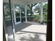 The home has a screened in porch with tile flooring at 12301 Mosswood Pl, Lakewood Ranch, FL 34202