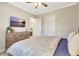 Calm bedroom with wood floors, serene decor, and ample natural light at 13918 Old Creek Ct, Parrish, FL 34219