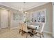 Elegant dining room features plantation shutters and is the perfect place to entertain Gathering and friends at 13918 Old Creek Ct, Parrish, FL 34219