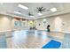 Bright fitness center with exercise equipment and open floor space at 13918 Old Creek Ct, Parrish, FL 34219