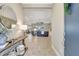 View of the bright and spacious entryway foyer featuring wood-look tile flooring, and an open concept living space at 13918 Old Creek Ct, Parrish, FL 34219