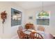 Charming dining area with wooden table set and sunlit windows, perfect for Gathering meals at 16807 Barnwood Pl, Bradenton, FL 34211