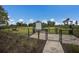 Community dog park featuring secure fencing and green space for pets to play and exercise freely at 16807 Barnwood Pl, Bradenton, FL 34211