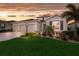 Charming home features a three car garage, stone accents, tropical landscaping, and an inviting front yard at 16807 Barnwood Pl, Bradenton, FL 34211