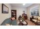 Comfortable living room with a sofa, wooden furniture, and an ornate décor at 16807 Barnwood Pl, Bradenton, FL 34211