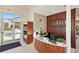 Modern reception area with wood accents and a view to the exterior at 16807 Barnwood Pl, Bradenton, FL 34211