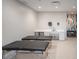Relaxing spa room with massage tables, sink area, and calming decor for a serene wellness experience at 16807 Barnwood Pl, Bradenton, FL 34211