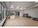 Spacious studio with wood floors, mirrors and natural light ideal for yoga and fitness activities at 16807 Barnwood Pl, Bradenton, FL 34211
