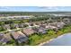 Aerial view of a residential neighborhood with serene lakes and lush green landscape at 17018 Blue Ridge Pl, Bradenton, FL 34211