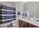 This bathroom has a vanity with plenty of storage and a shower and tub combo at 17018 Blue Ridge Pl, Bradenton, FL 34211
