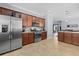 Spacious kitchen with stainless steel appliances and ample cabinet storage at 17018 Blue Ridge Pl, Bradenton, FL 34211