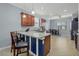 Bright kitchen features granite countertops, wooden cabinets, and tile flooring at 17018 Blue Ridge Pl, Bradenton, FL 34211