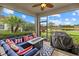 Relax on this enclosed lanai with outdoor seating and a lovely view of the greenery at 17018 Blue Ridge Pl, Bradenton, FL 34211