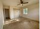 Bedroom featuring a ceiling fan and closet at 1905 Yale Ave, Bradenton, FL 34207