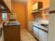 Functional kitchen space with stainless steel sink, and tile flooring at 1905 Yale Ave, Bradenton, FL 34207
