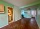 Open living area with attached bathroom and rear entry to backyard at 1905 Yale Ave, Bradenton, FL 34207