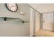 Inviting entryway features a glass shelf and storage closet at 2045 Gulf Of Mexico Dr # M1-302, Longboat Key, FL 34228