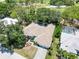 Aerial view of a beautiful home with landscaping near a golf course community at 2067 Tocobaga Ln, Nokomis, FL 34275