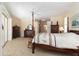 Spacious primary bedroom with a sitting area, and an ensuite bathroom at 2067 Tocobaga Ln, Nokomis, FL 34275