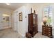 Bedroom with an armoire and desk adjacent to the primary bathroom at 2067 Tocobaga Ln, Nokomis, FL 34275