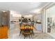 Eat-in kitchen with stainless appliances, granite countertops, and backyard access at 2067 Tocobaga Ln, Nokomis, FL 34275