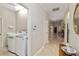 Convenient laundry room with modern appliances and ample storage space at 2067 Tocobaga Ln, Nokomis, FL 34275