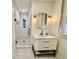 Bathroom with a glass enclosed shower and modern vanity at 210 N 17Th W St # 15, Bradenton, FL 34205