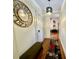 Bright hallway with decorative mirror and bench at 210 N 17Th W St # 15, Bradenton, FL 34205