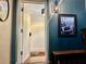 Foyer entry with decorative mirror and lantern at 210 N 17Th W St # 15, Bradenton, FL 34205