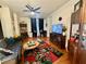 Spacious living room featuring hardwood floors, ceiling fan and neutral paint at 210 N 17Th W St # 15, Bradenton, FL 34205