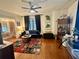 Spacious living room featuring hardwood floors and neutral paint at 210 N 17Th W St # 15, Bradenton, FL 34205
