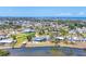 Stunning aerial view of the coastal community showcasing waterfront homes and scenic landscape at 2100 Oyster Creek Dr, Englewood, FL 34224