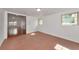 A bonus room or flex space offers additional living area with a tile floor and a large window at 2620 8Th N Ave, St Petersburg, FL 33713