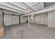 Spacious garage with two car bays, concrete floor and exposed ceiling beams at 2620 8Th N Ave, St Petersburg, FL 33713