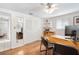 Office space with wood floors, a closet, and a desk at 2726 Silver King Way, Sarasota, FL 34231