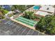 Aerial view showing the neighborhood community with a waterway, boat docks, and homes at 2733 Riverbluff Pl # V57, Sarasota, FL 34231