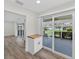 Open dining area with sliding glass doors to the lanai for seamless indoor-outdoor living at 2733 Riverbluff Pl # V57, Sarasota, FL 34231