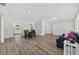 Bright living room with wood floors at 2733 Riverbluff Pl # V57, Sarasota, FL 34231