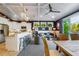 This living area combines an open-concept floor plan, with the kitchen featuring granite counters and updated appliances at 307B 63Rd St, Holmes Beach, FL 34217