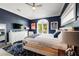 Comfortable main bedroom with large windows, balcony access, and en-suite bath at 307B 63Rd St, Holmes Beach, FL 34217
