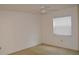 Neutral bedroom featuring carpet and a window with blinds at 3269 Beneva Rd # 203, Sarasota, FL 34232