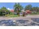 Scenic view of Village Brooke Condominiums with lush landscaping and well-maintained grounds at 3269 Beneva Rd # 203, Sarasota, FL 34232