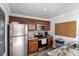 Well-equipped kitchen featuring stainless steel appliances, granite countertops, and ample cabinet space at 3269 Beneva Rd # 203, Sarasota, FL 34232