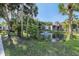 Scenic pond with a fountain, surrounded by lush greenery and well-maintained landscaping at 3269 Beneva Rd # 203, Sarasota, FL 34232
