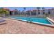 Community pool with plenty of room to swim, and ladders for easy access in and out at 3269 Beneva Rd # 203, Sarasota, FL 34232