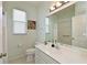 Clean bathroom with a large mirror, vanity, and shower/tub combination at 3309 45Th E Ave, Bradenton, FL 34203